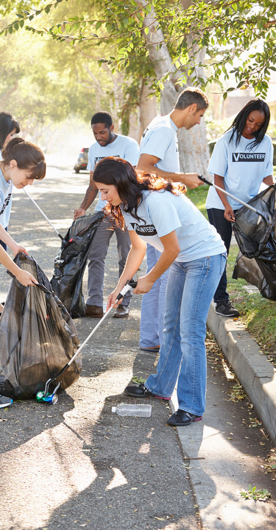 Himfirst volunteers picking up trash